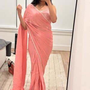 Elegant Pink Saree with Embellished Blouse